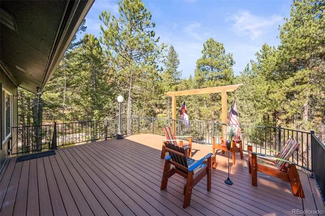 a living room with furniture fireplace and a flat screen tv