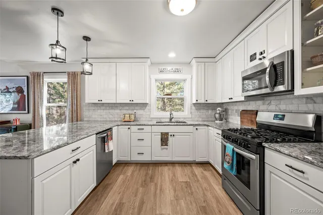a living room with a couch and a flat screen tv