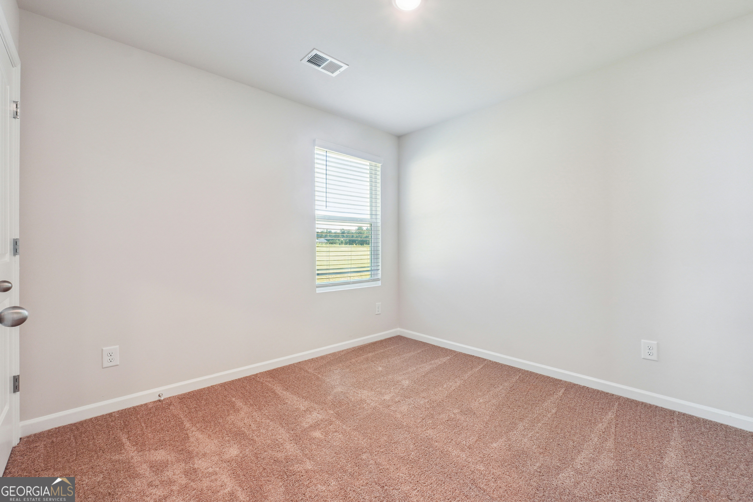 210 Harris Walk, Unit 79 Cataula, GA 31804 - Photo 17 of 22 an empty room with a window