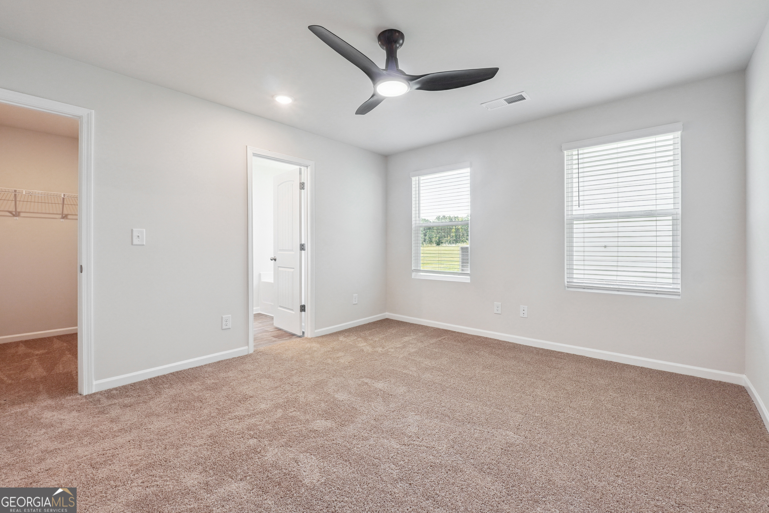 210 Harris Walk, Unit 79 Cataula, GA 31804 - Photo 10 of 22 a view of an empty room with a window