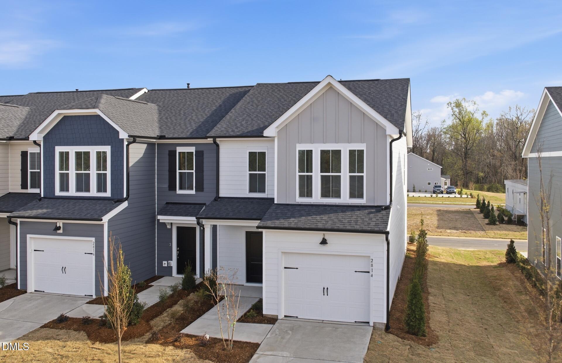 2814 Rodeo Court Fuquay-Varina, NC 27526 - Photo 3 of 31 a front view of a house with a yard
