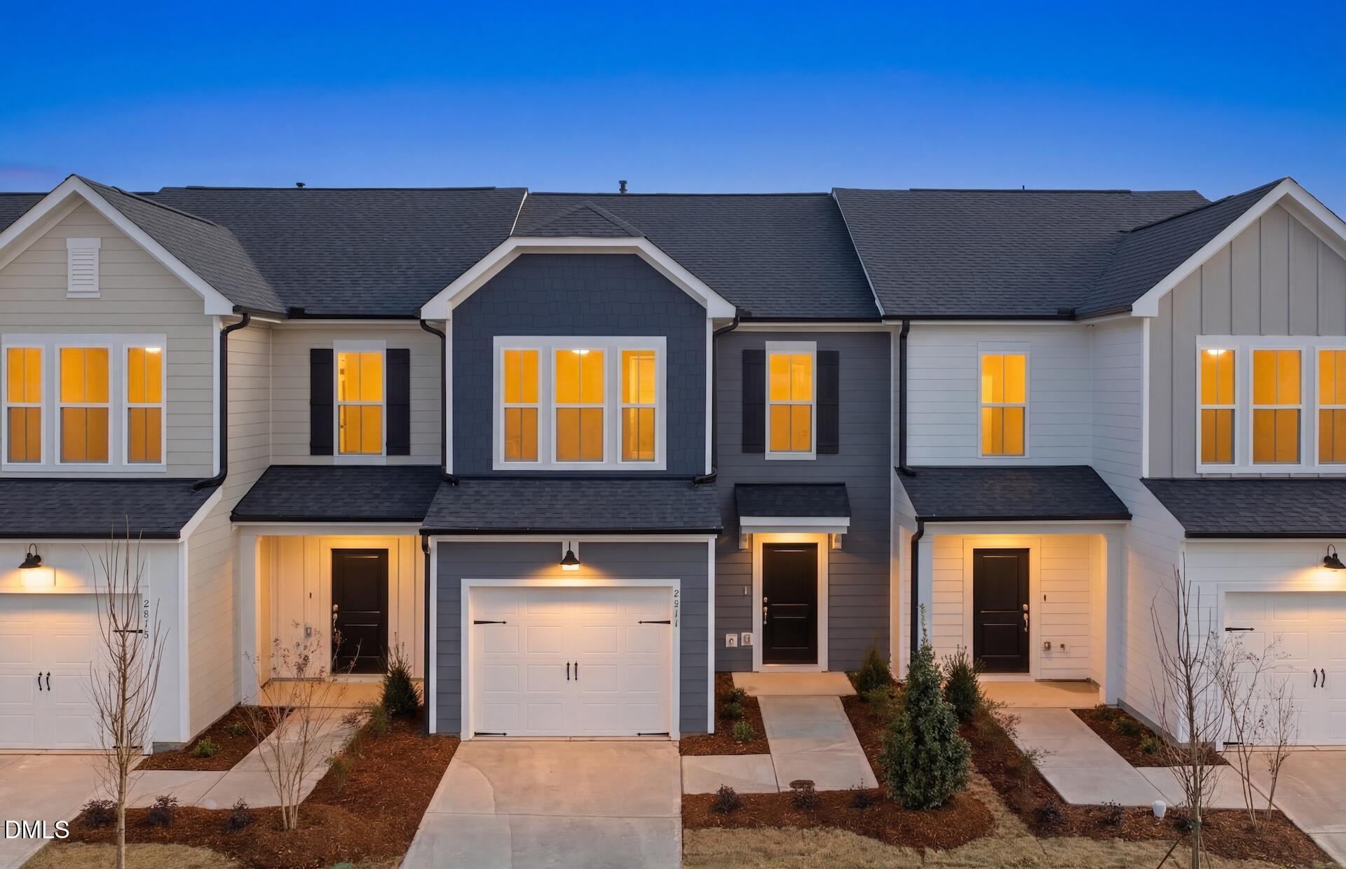 2814 Rodeo Court Fuquay-Varina, NC 27526 - Photo 4 of 31 a front view of a house with a yard
