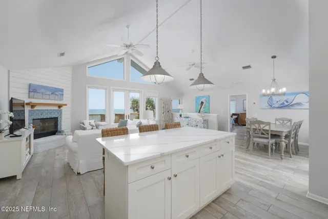 a view of a balcony with wooden floor