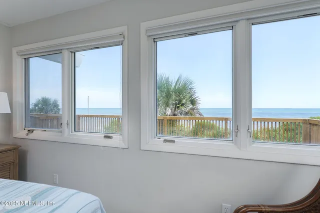 a bathroom with a toilet a sink and a mirror