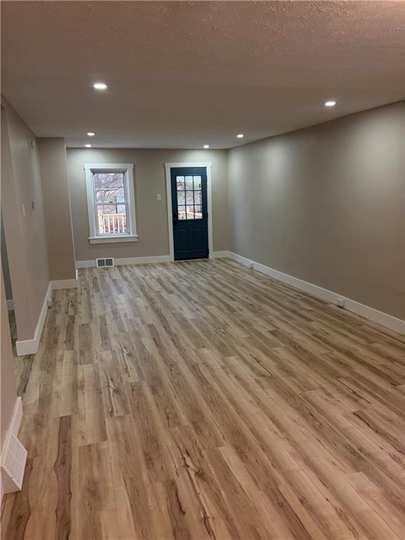 8 Ziskind Road Fredericktown, PA 15333 - Photo 15 of 31 a view of an empty room and window and wooden floor