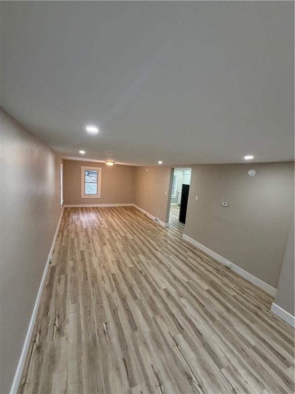 8 Ziskind Road Fredericktown, PA 15333 - Photo 16 of 31 a empty room with wooden floor and windows