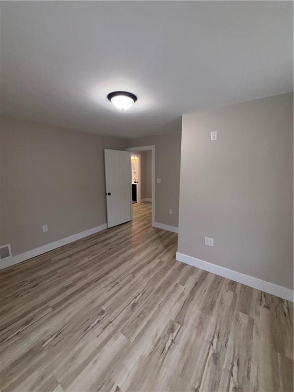 8 Ziskind Road Fredericktown, PA 15333 - Photo 22 of 31 a view of an empty room with wooden floor
