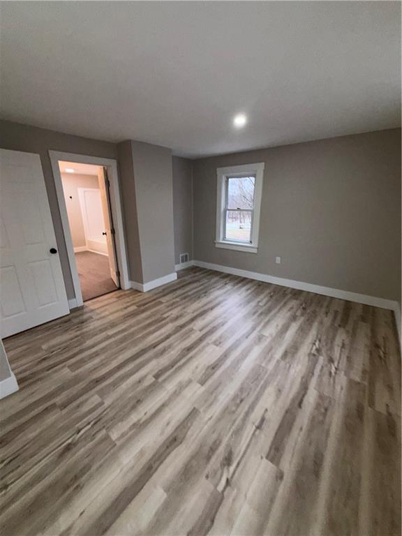 8 Ziskind Road Fredericktown, PA 15333 - Photo 24 of 31 a view of empty room with wooden floor and fan