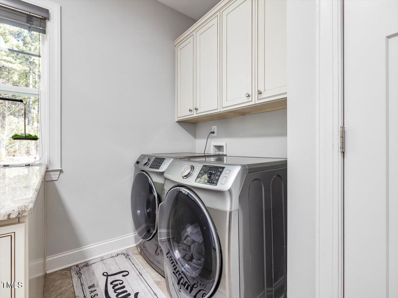 406 Gum Springs Church Road Moncure, NC 27559 - Photo 37 of 100 a utility room with dryer and washer