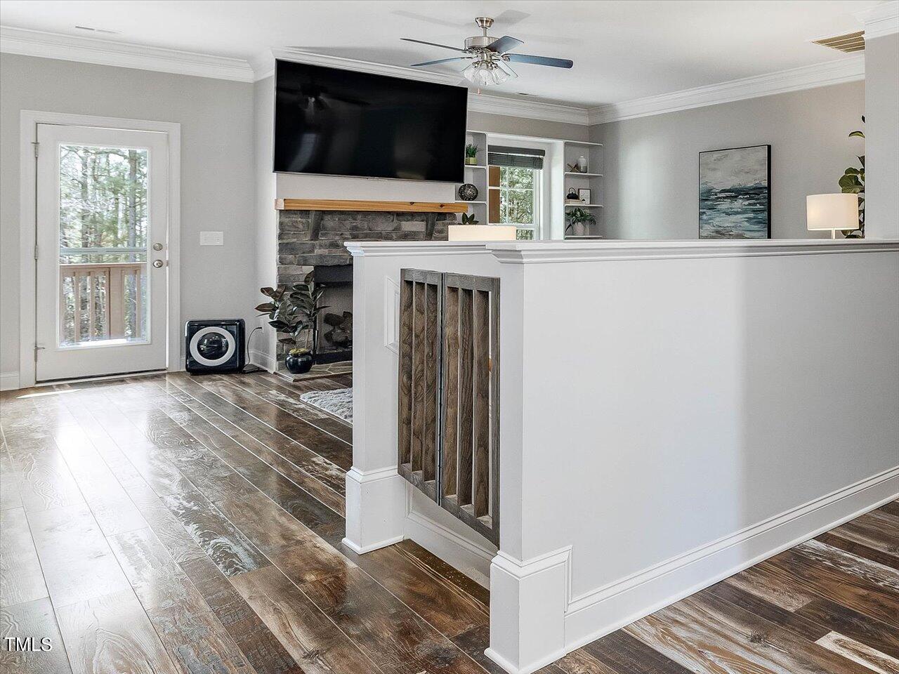 406 Gum Springs Church Road Moncure, NC 27559 - Photo 45 of 100 a living room with furniture and a flat screen tv