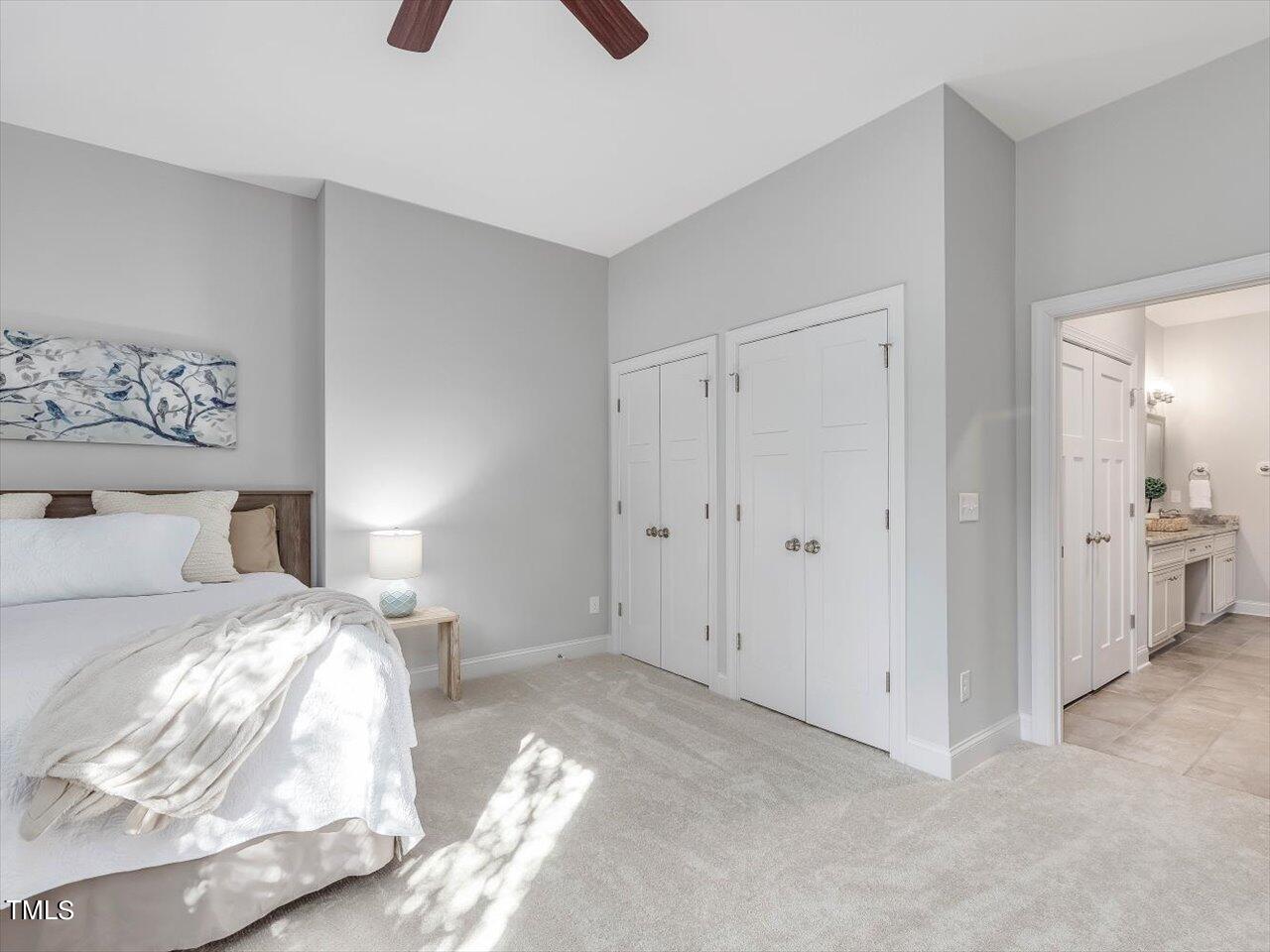 406 Gum Springs Church Road Moncure, NC 27559 - Photo 54 of 100 a bedroom with a bed and a view of bathroom