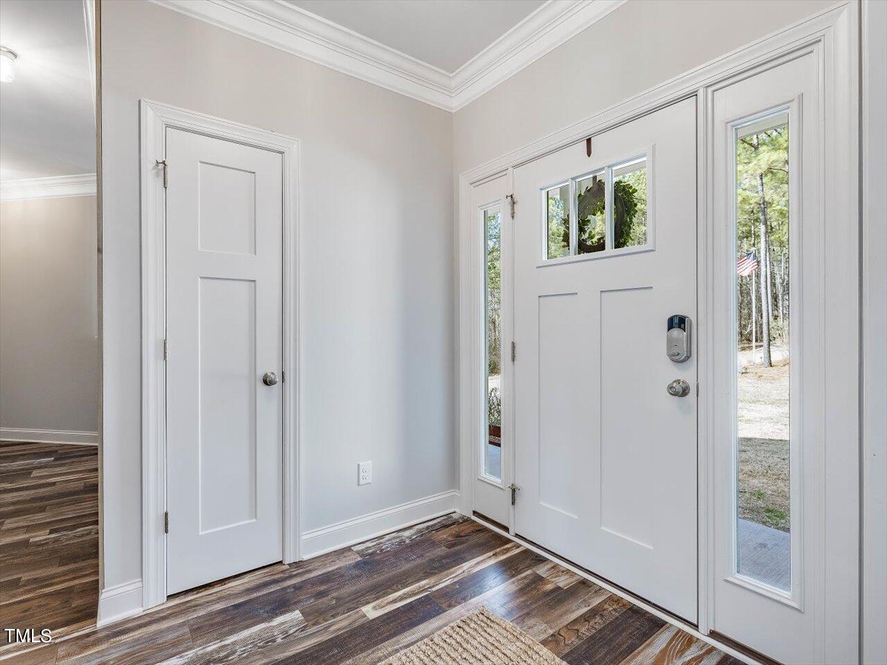 406 Gum Springs Church Road Moncure, NC 27559 - Photo 10 of 100 a view of an entryway with wooden floor