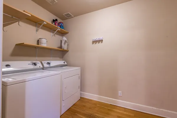 a utility room with dryer and washer