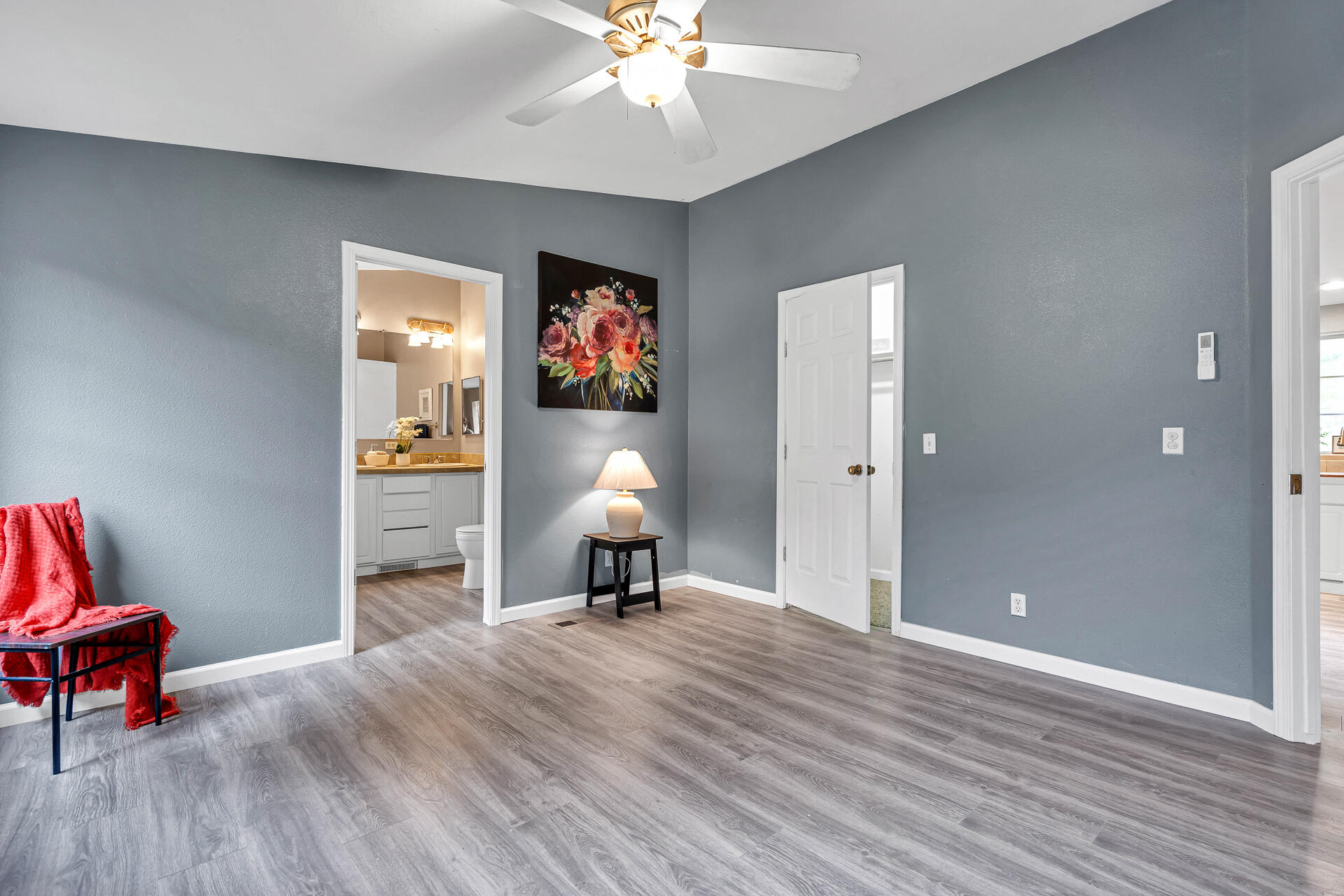 22150 Ravine Court Redding, CA 96003 - Photo 19 of 37 a view of a livingroom with a workspace and a window