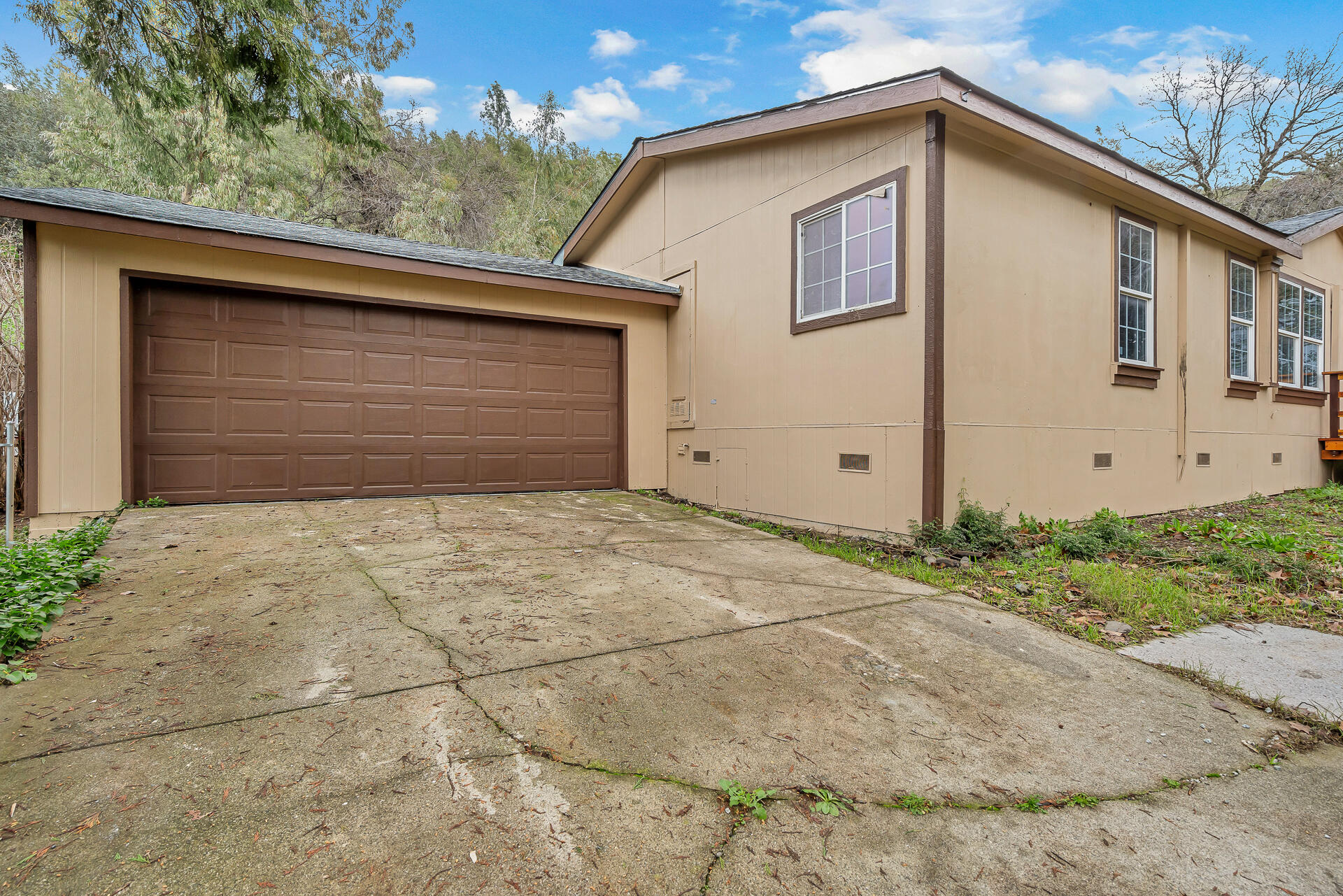 22150 Ravine Court Redding, CA 96003 - Photo 2 of 37 a backyard of a house