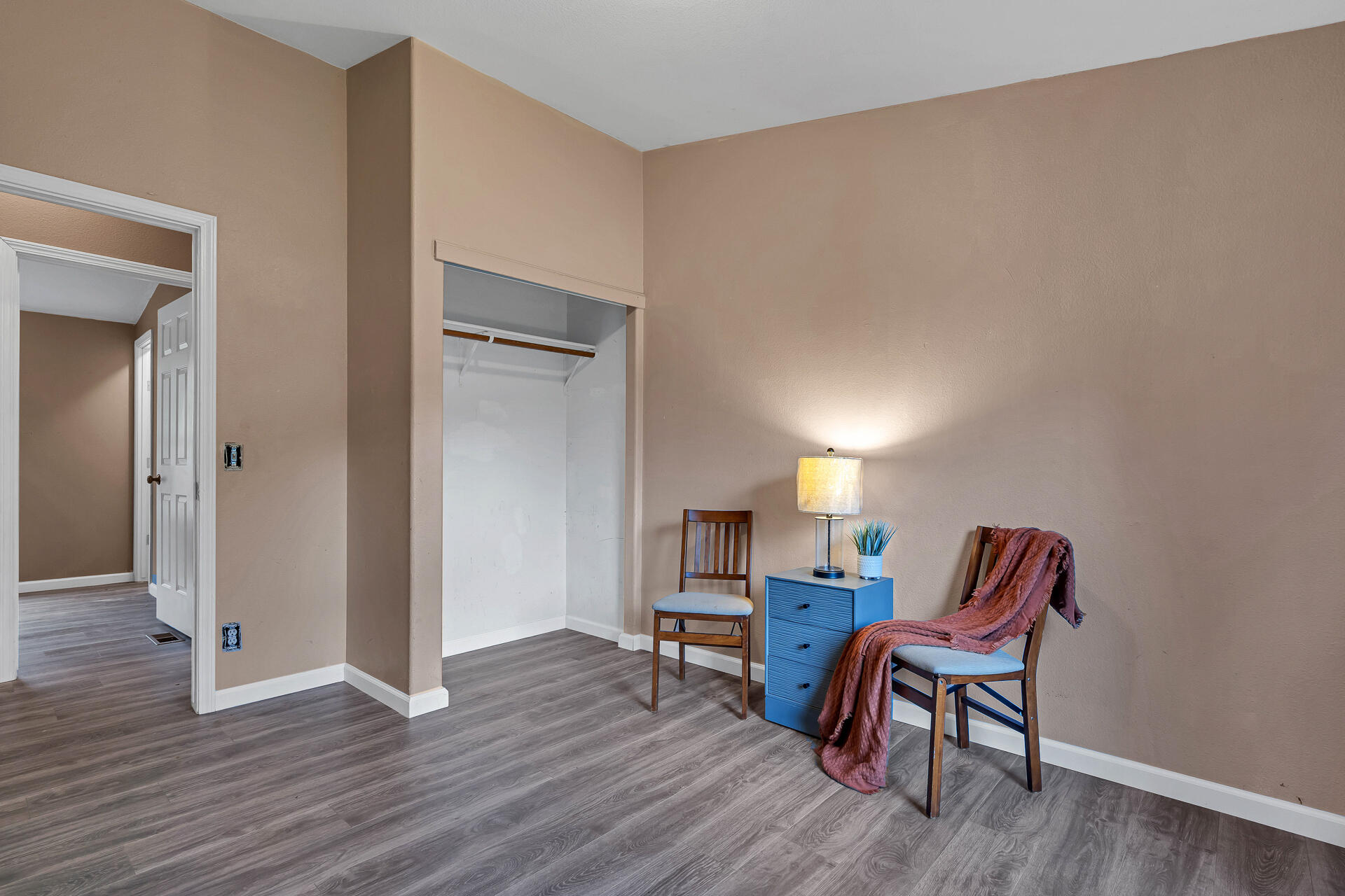 22150 Ravine Court Redding, CA 96003 - Photo 28 of 37 a living room with furniture and a wooden floor