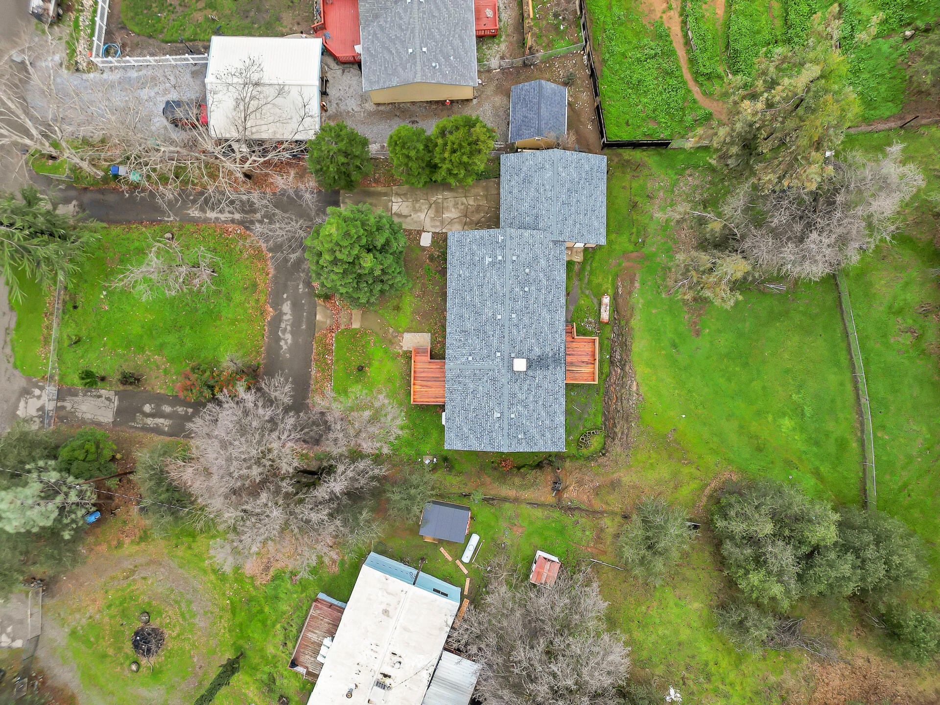22150 Ravine Court Redding, CA 96003 - Photo 31 of 37 an aerial view of a house with a yard