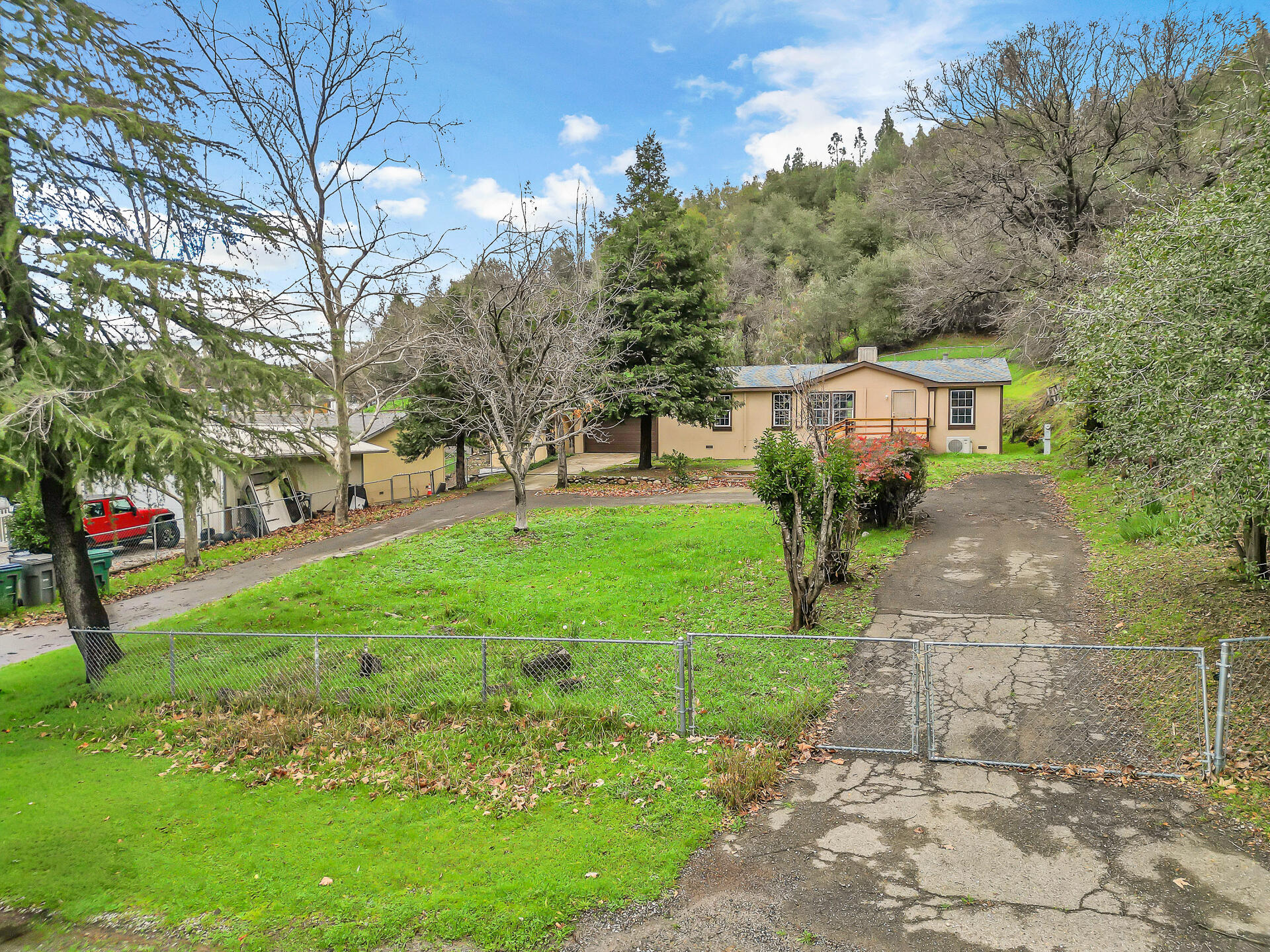 22150 Ravine Court Redding, CA 96003 - Photo 4 of 37 a view of a park with large trees