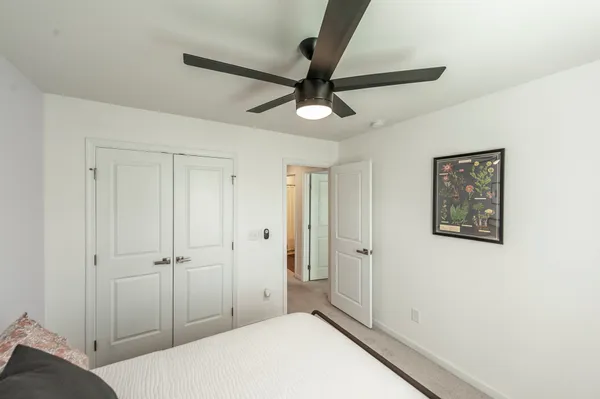a view of a hallway with closet area