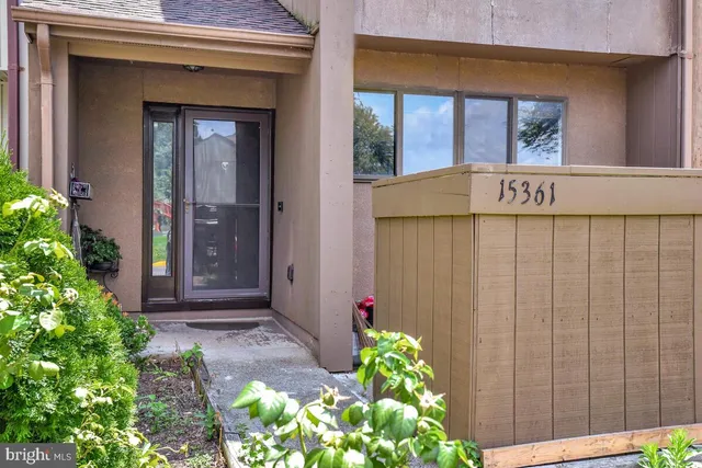 a view of a door with a potted plant