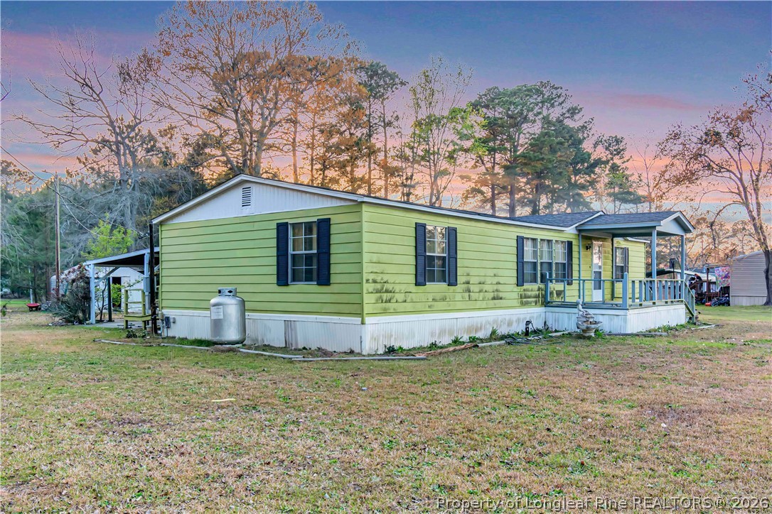 727 Rice Road Lumberton, NC 28358 - Photo 2 of 30 a view of a house with a yard