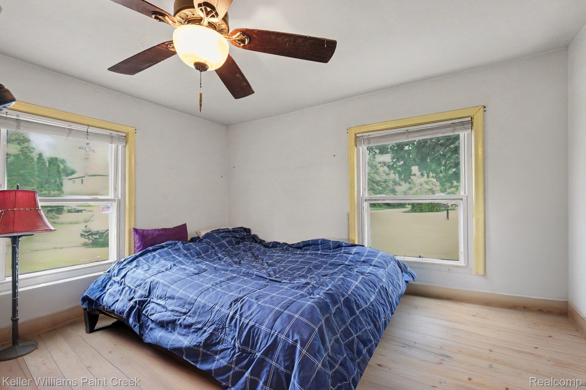 2340 Hessel Avenue Rochester, MI 48307 - Photo 10 of 25 Room featuring light-toned wood flooring and white walls