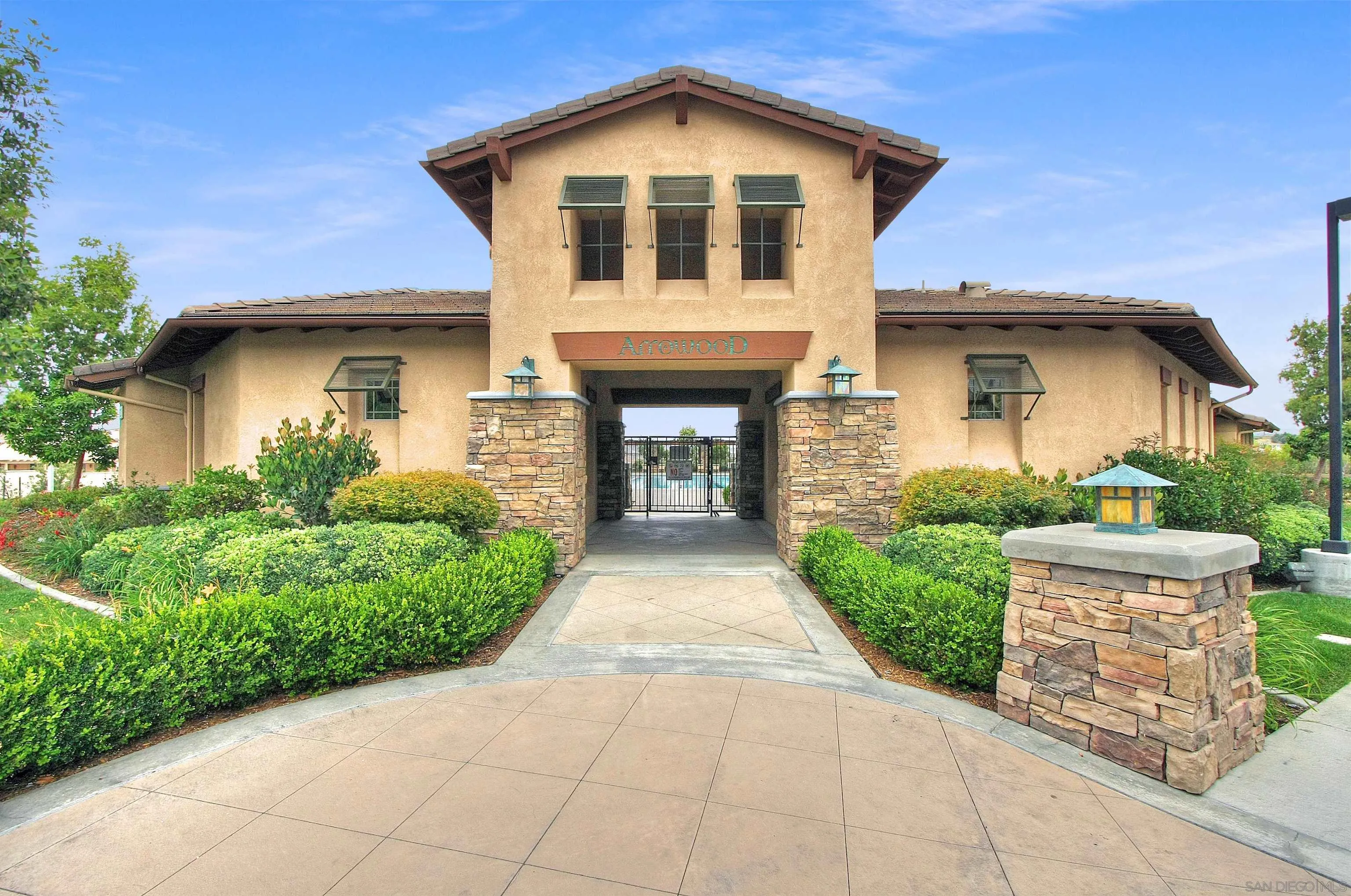 1091 Greenway Road Oceanside, CA 92057 - Photo 24 of 26 a front view of a house with garden