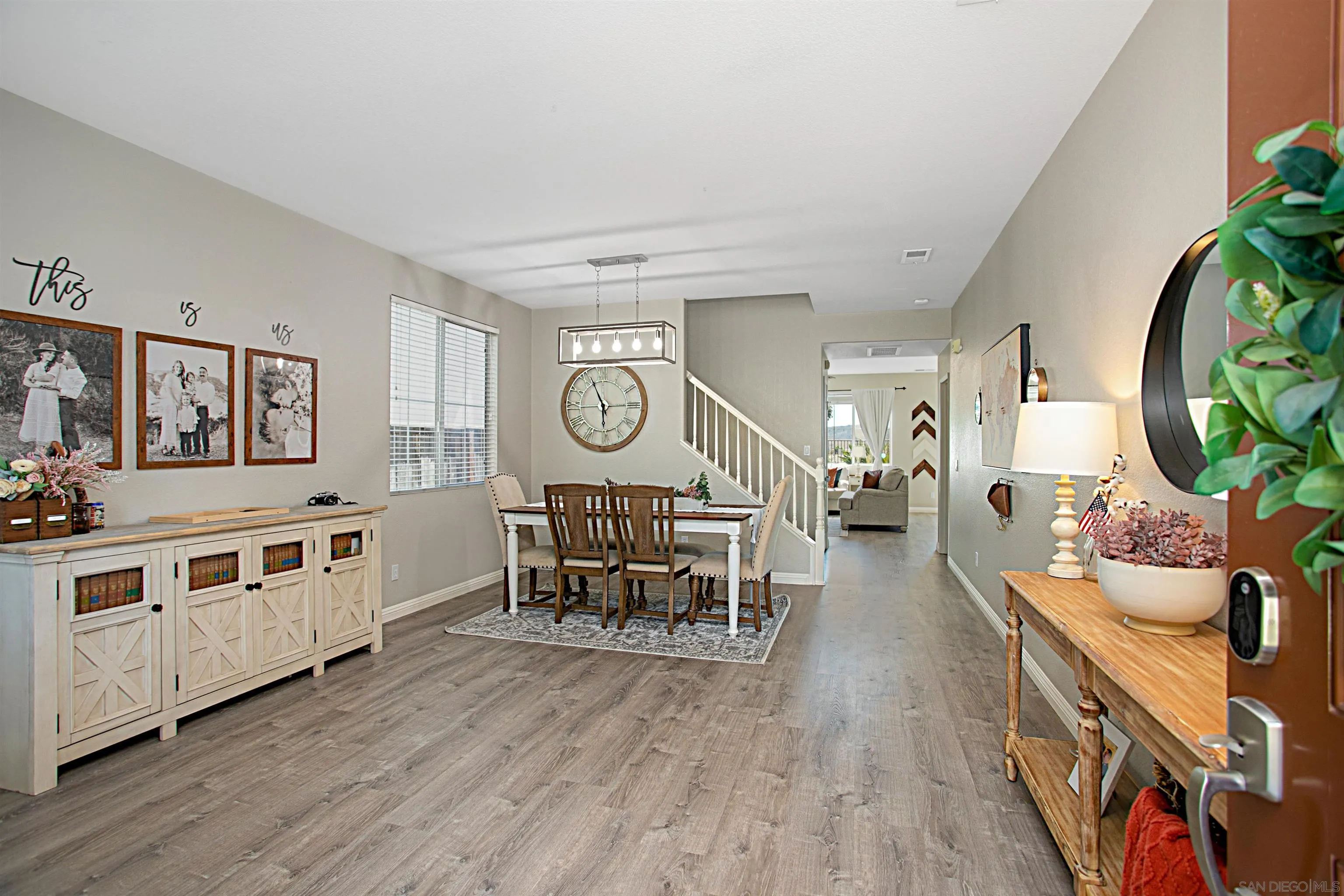 1091 Greenway Road Oceanside, CA 92057 - Photo 3 of 26 a living room with furniture and a wooden floor