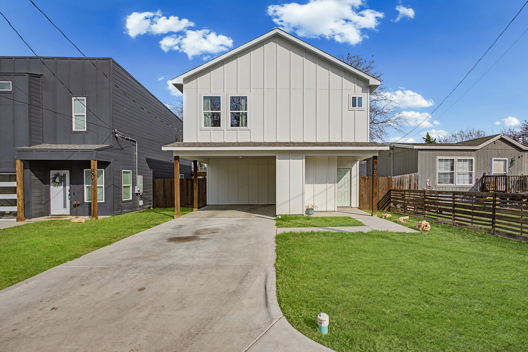 803 4th Street Lockhart, TX 78644 - Photo 1 of 1 a front view of a house with a yard