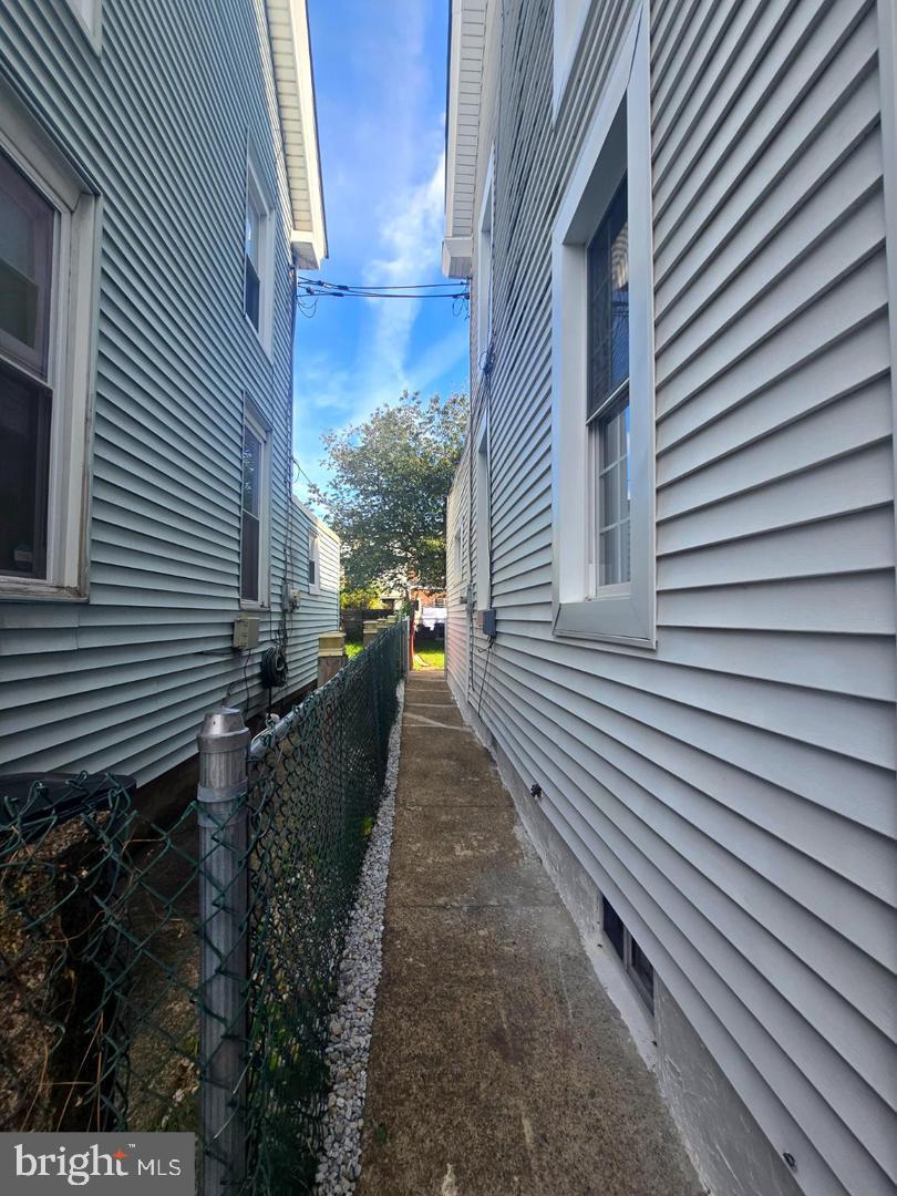 4907 Rawle Street Philadelphia, PA 19135 - Photo 4 of 24 a view of a pathway with a house