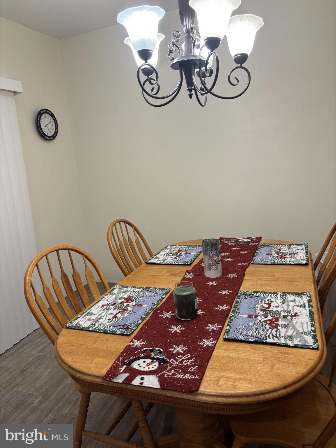 4907 Rawle Street Philadelphia, PA 19135 - Photo 9 of 24 a view of a dining room with furniture and chandelier