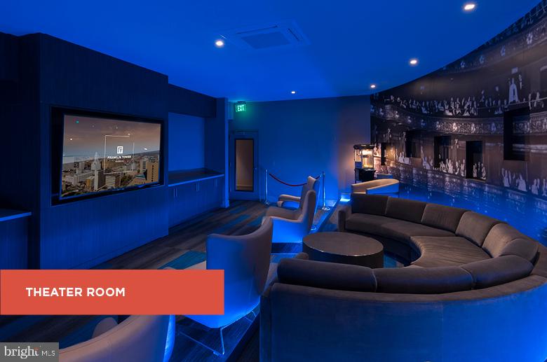 200 North 16th Street, Unit 1624 Philadelphia, PA 19102 - Photo 31 of 66 a living room with furniture and a flat screen tv