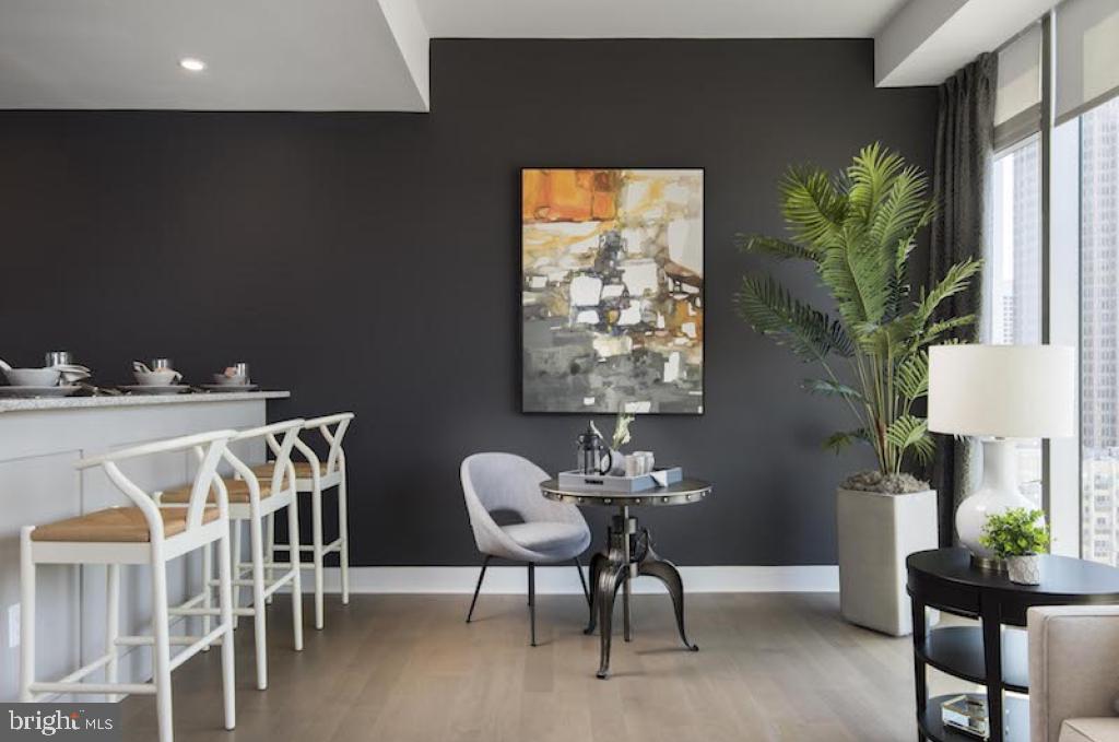 200 North 16th Street, Unit 1624 Philadelphia, PA 19102 - Photo 45 of 66 a view of a dining room with furniture and a potted plant