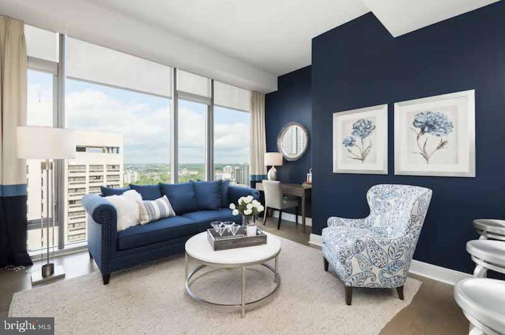 200 North 16th Street, Unit 1624 Philadelphia, PA 19102 - Photo 53 of 66 a living room with furniture and a large window