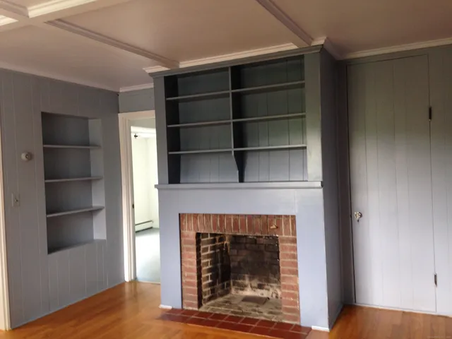 a living room with a fireplace
