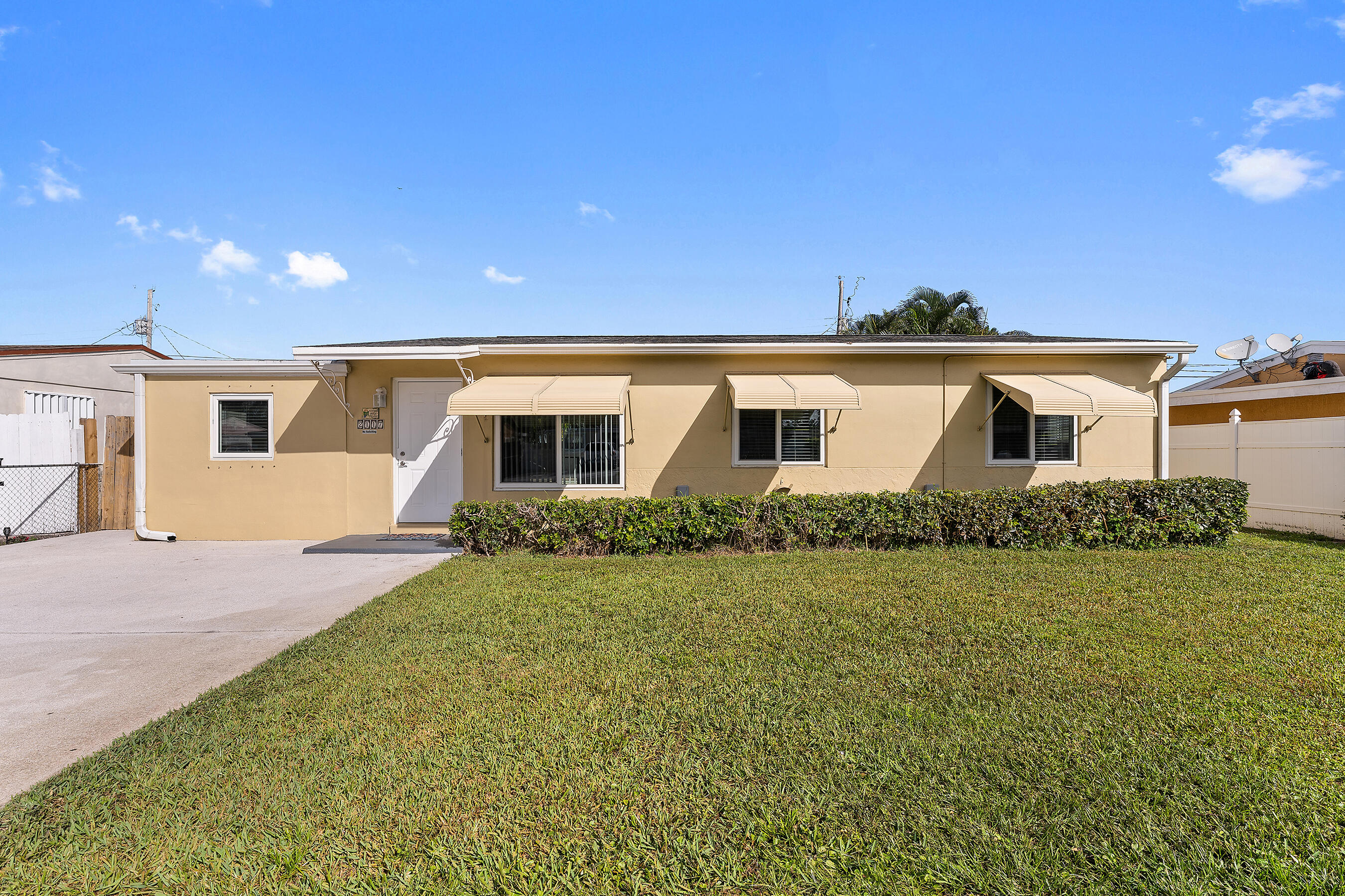 2117 Longwood Road West Palm Beach, FL 33409 - Photo 1 of 38 Front Exterior