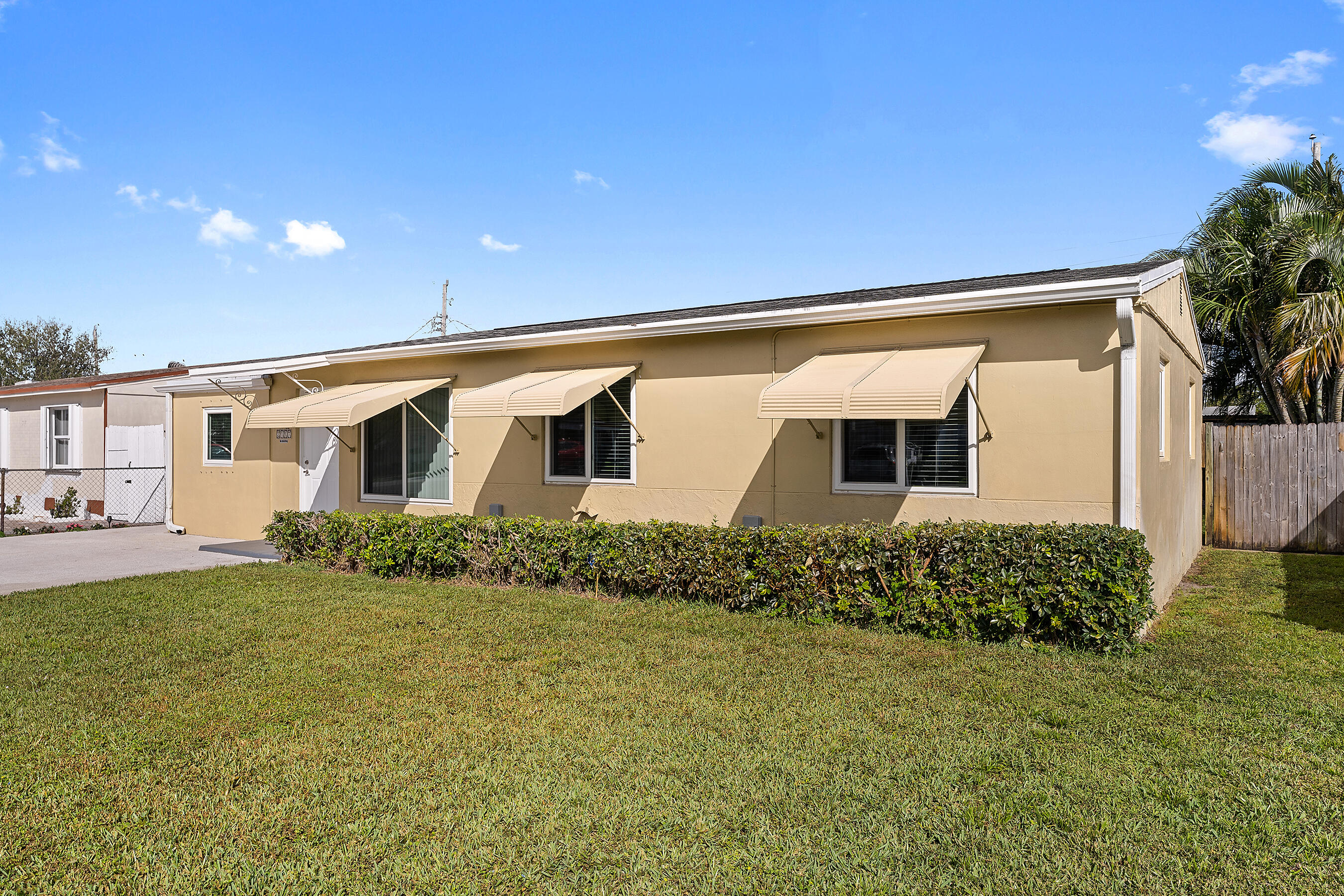 2117 Longwood Road West Palm Beach, FL 33409 - Photo 2 of 38 Front Exterior