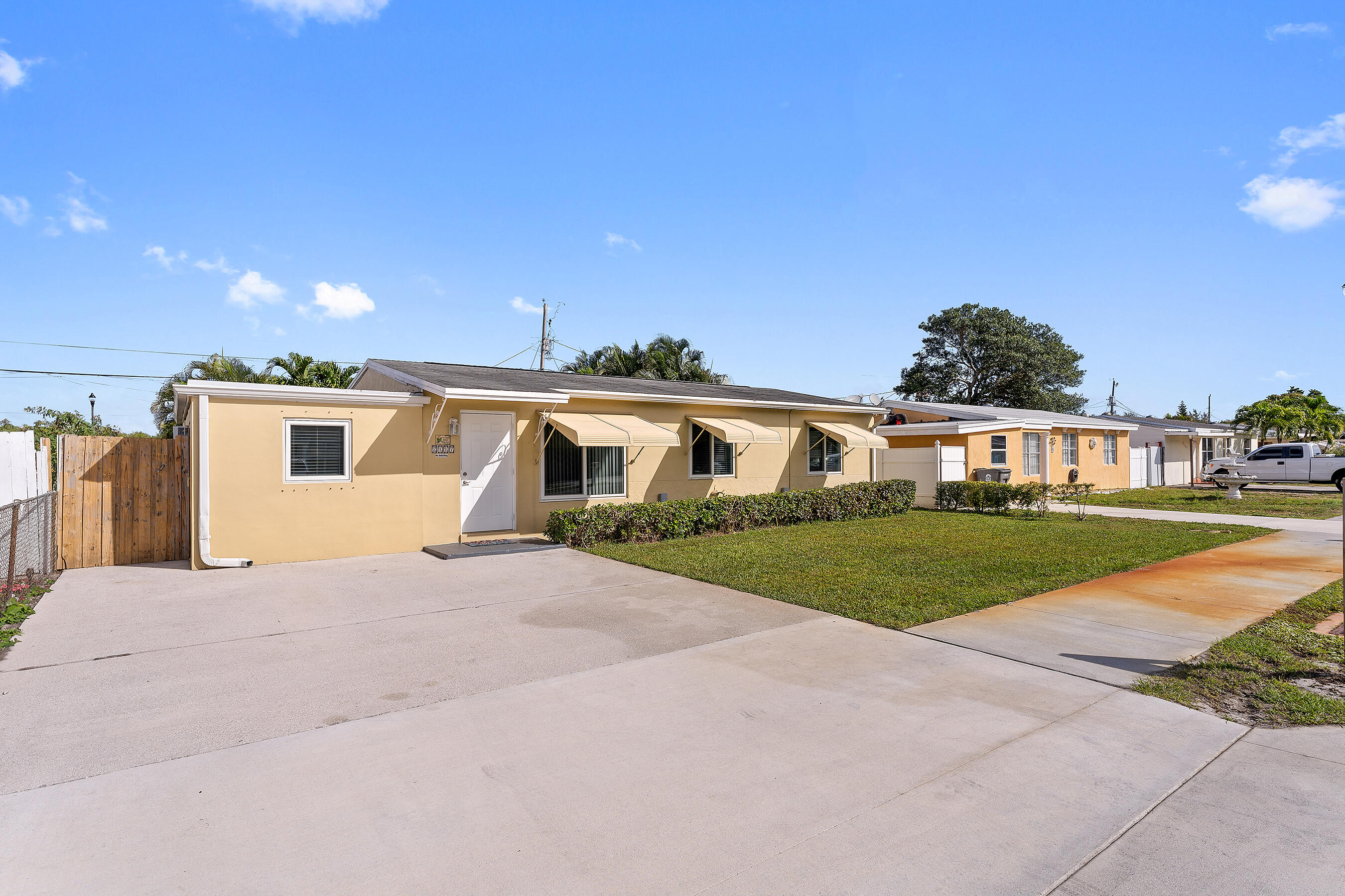 2117 Longwood Road West Palm Beach, FL 33409 - Photo 3 of 38 Front Exterior
