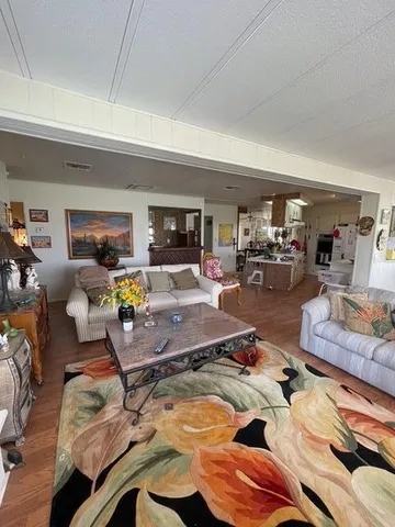 a room with furniture kitchen view and a window