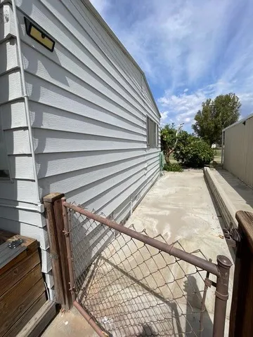 a view of backyard with green space