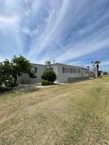 a view of backyard with green space