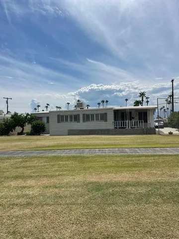 a view of a swimming pool with an ocean view