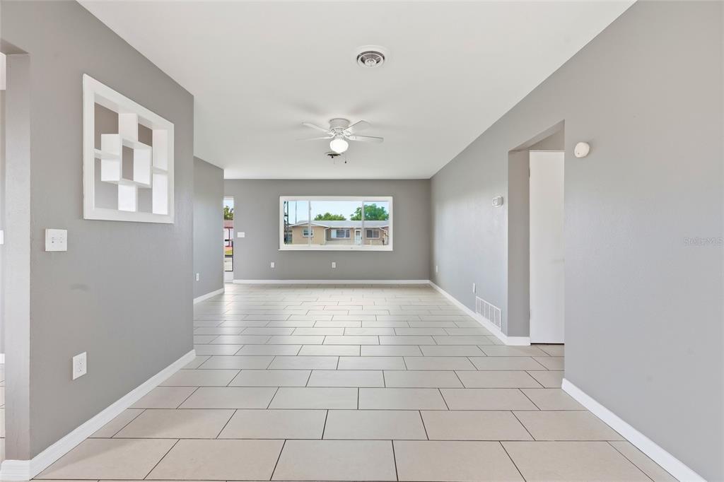 363 Glen Oak Road Venice, FL 34293 - Photo 17 of 53 a view of an empty room with a window