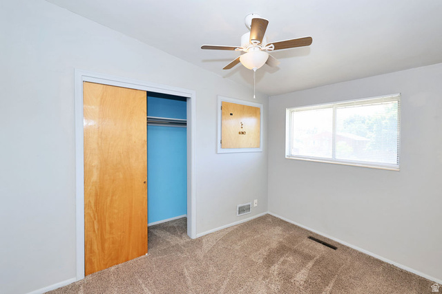 1272 Cook Street Ogden, UT 84404 - Photo 26 of 46 Room featuring light gray walls and brown patterned carpeting