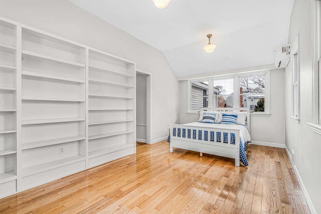 4 Retrop Road Natick, MA 01760 - Photo 19 of 26 a view of a room with wooden floor and windows