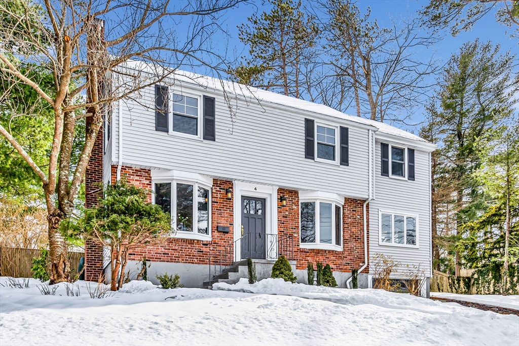 4 Retrop Road Natick, MA 01760 - Photo 2 of 26 a front view of a house