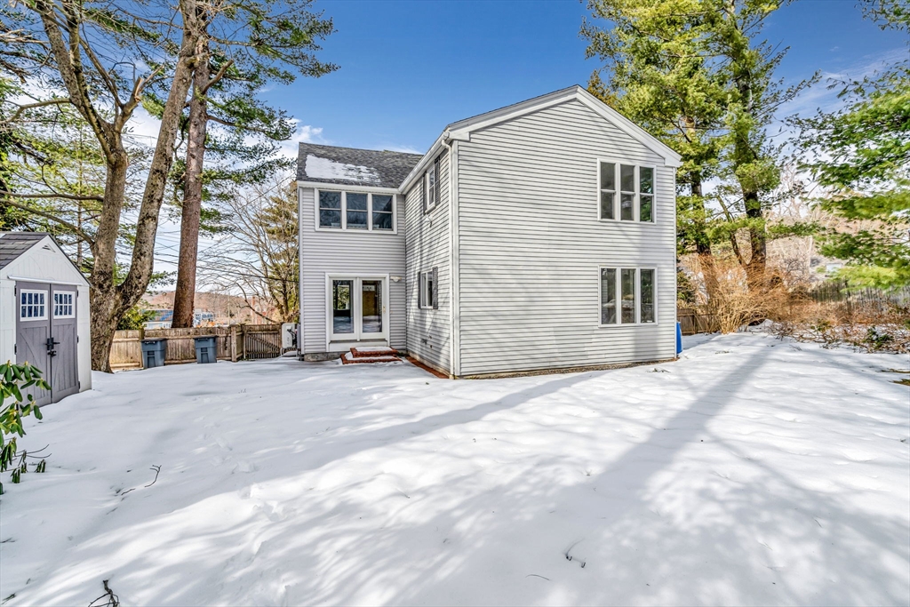4 Retrop Road Natick, MA 01760 - Photo 25 of 26 a view of a house with a yard