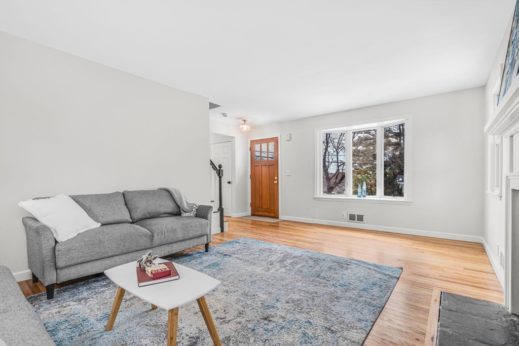 4 Retrop Road Natick, MA 01760 - Photo 6 of 26 a living room with furniture and a window