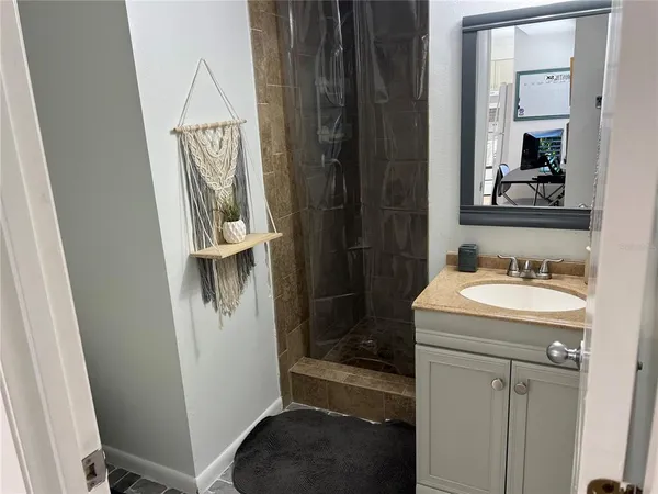 a bedroom with a bed and a closet