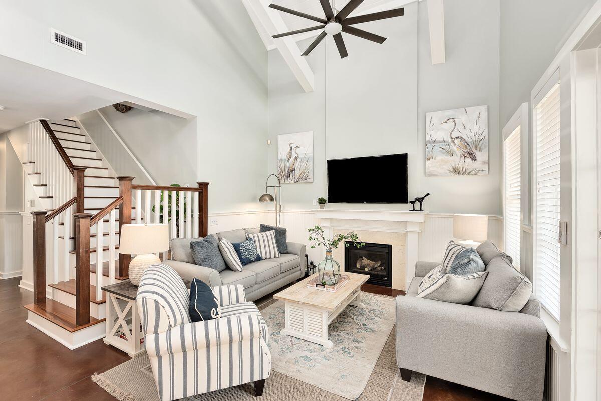 220 Salt Lane Watersound, FL 32461 - Photo 2 of 35 a living room with furniture fireplace and flat screen tv